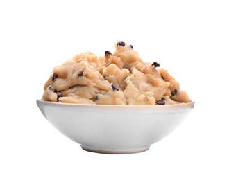 Raw cookie dough with chocolate chips in bowl on white background