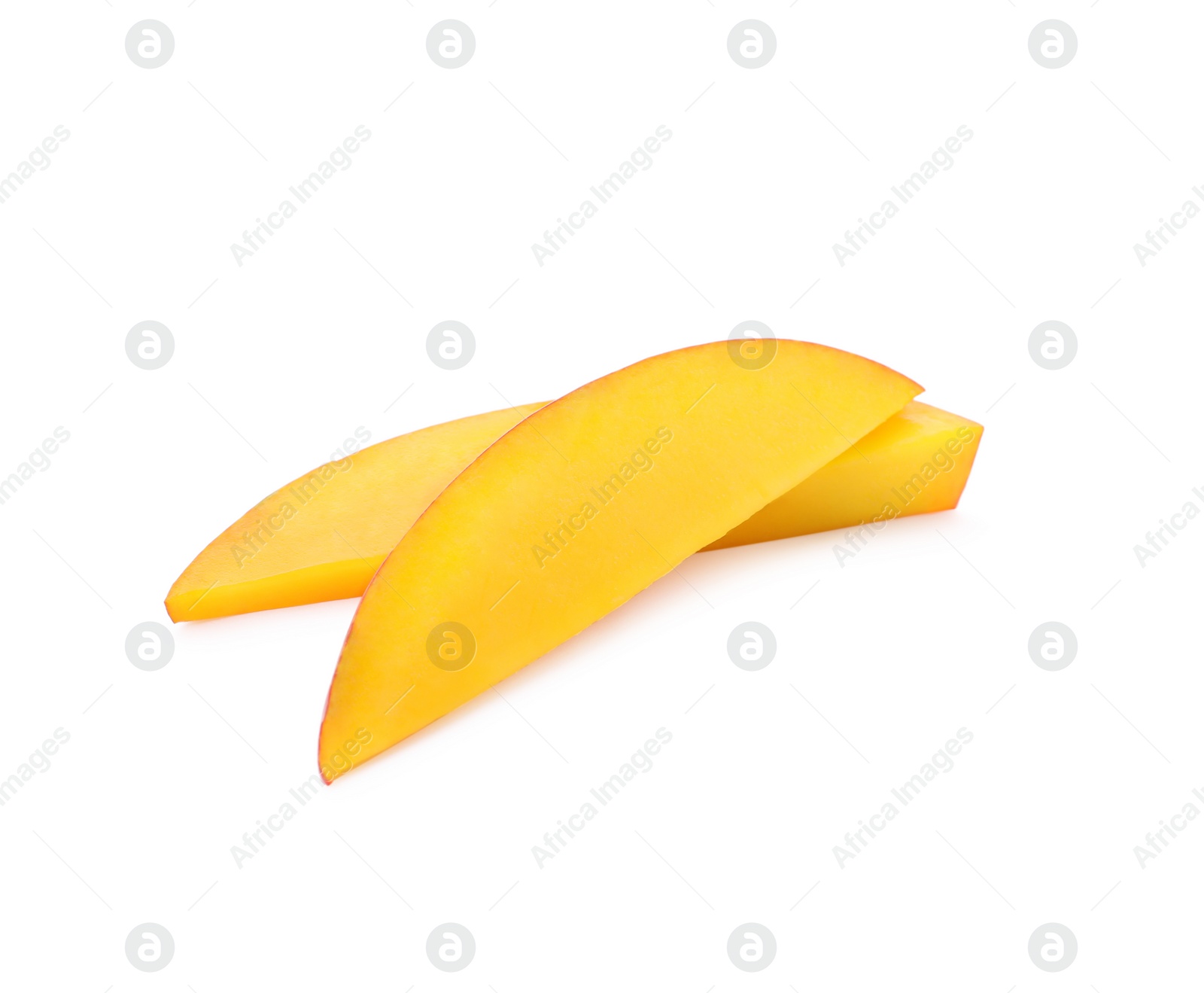 Photo of Slices of ripe mango isolated on white. Exotic fruit