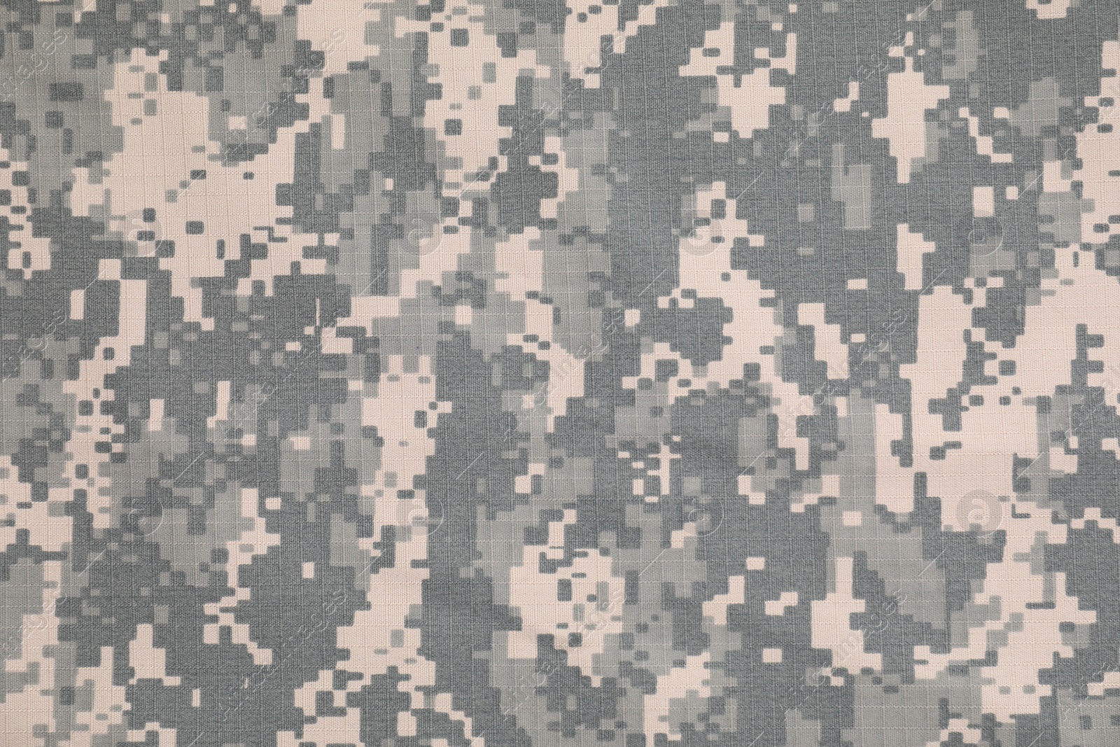 Photo of Texture of camouflage fabric as background, top view