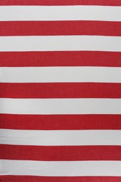 Photo of Striped beach towel as background, top view