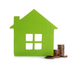 Photo of House model and coins on white background. Money saving concept