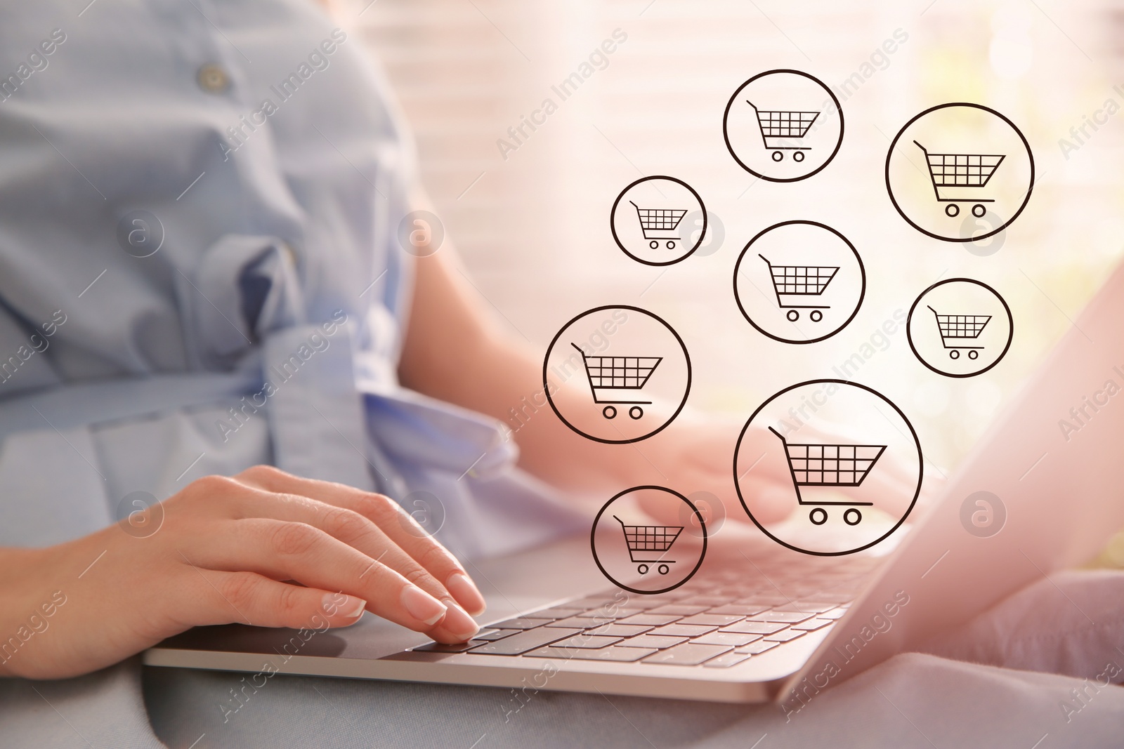 Image of Woman using laptop for online shopping at home, closeup