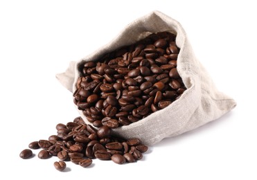 Overturned bag with roasted coffee beans isolated on white