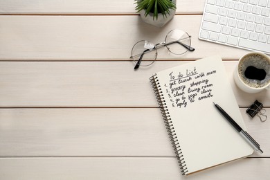 Flat lay composition with to do list on white wooden table, space for text