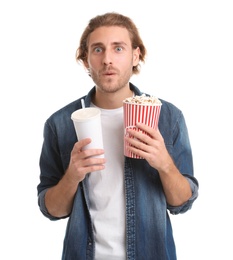 Photo of Emotional man with popcorn and beverage during cinema show on white background