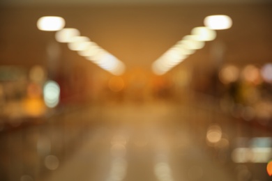 Blurred view of modern shopping mall interior