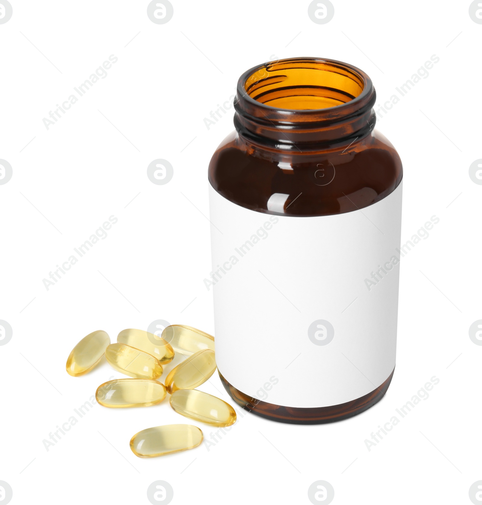 Photo of Bottle and pile of softgel capsules isolated on white