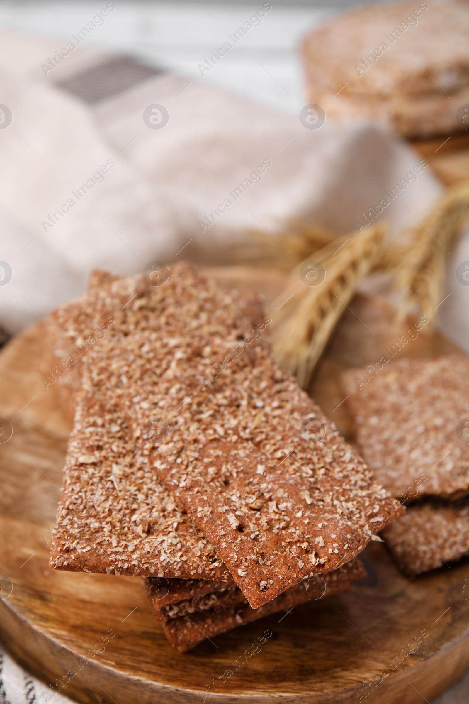 Photo of Stack of dry rye crispbreads on table, closeup