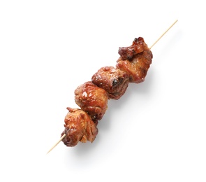 Skewer with delicious barbecued meat on white background