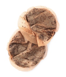 Photo of Used tea bags on white background, top view