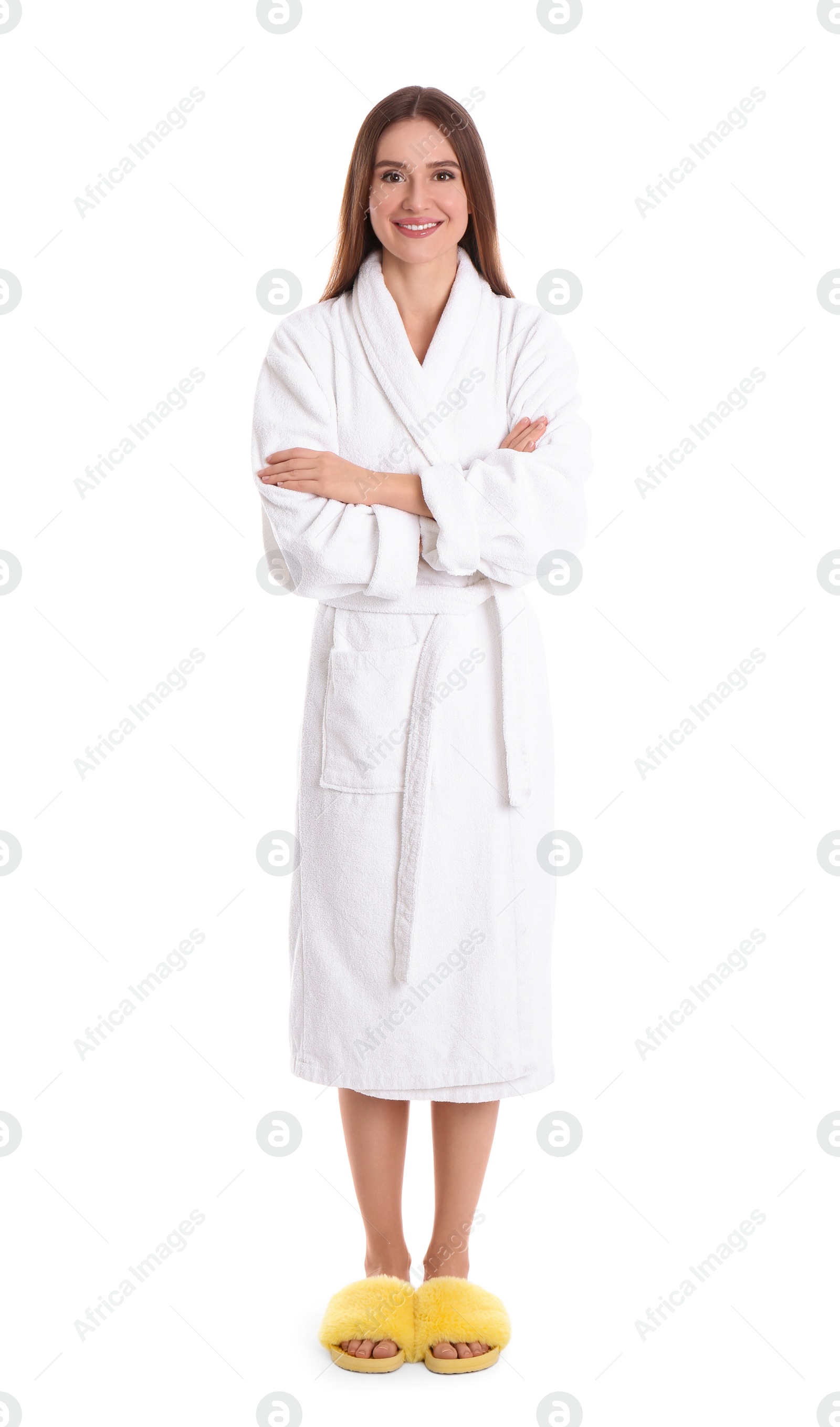 Photo of Young woman in bathrobe on white background