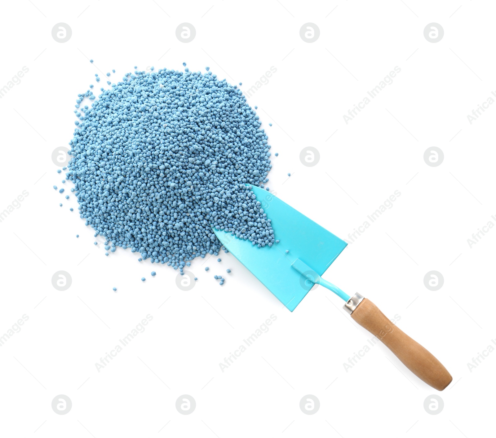 Photo of Pile of granular mineral fertilizer and shovel on white background, top view