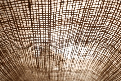 Texture of natural burlap fabric as background, closeup