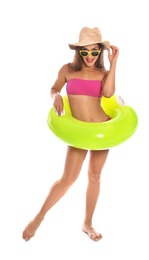 Photo of Beautiful young woman with inflatable ring on white background