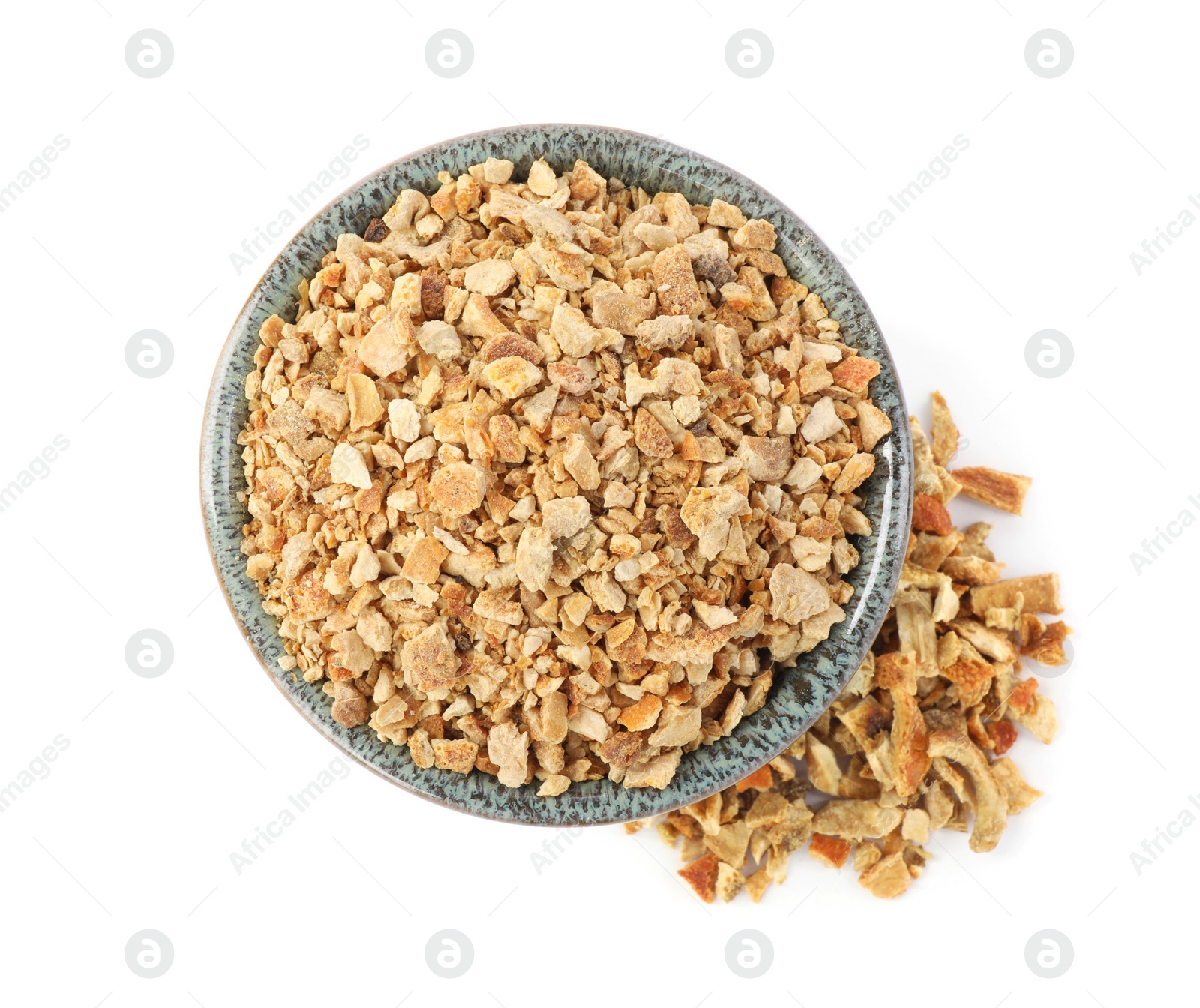 Photo of Bowl of dried orange zest seasoning isolated on white, top view