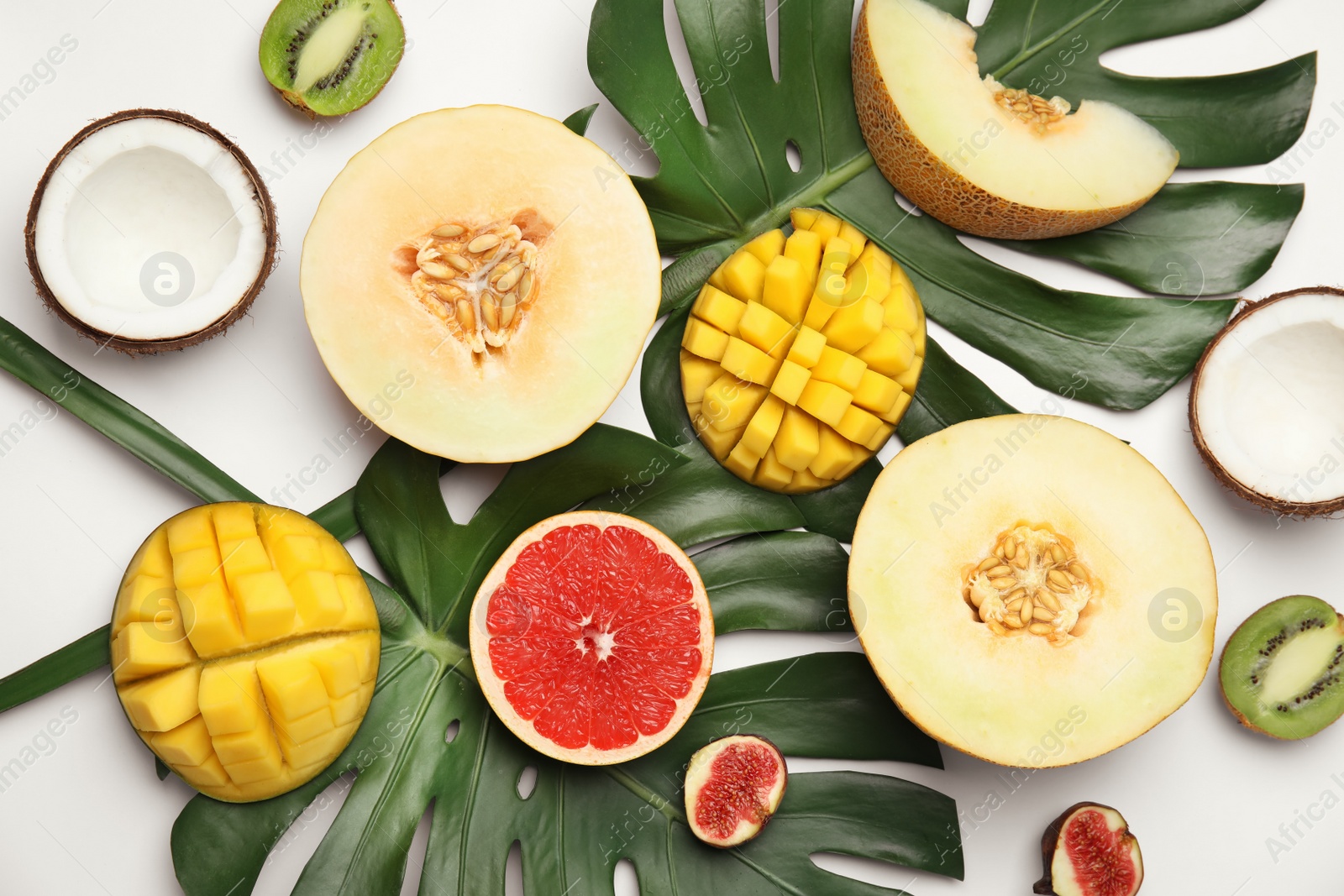 Photo of Flat lay composition with melon and other fruits on white background