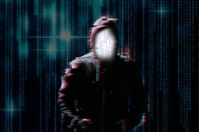 Silhouette of anonymous hacker and digital binary code on dark background. Cyber attack concept