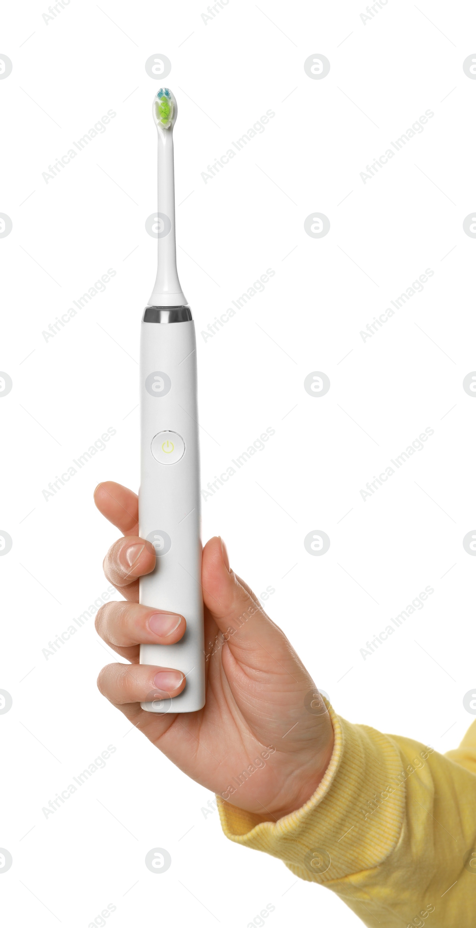 Photo of Woman holding electric toothbrush on white background, closeup