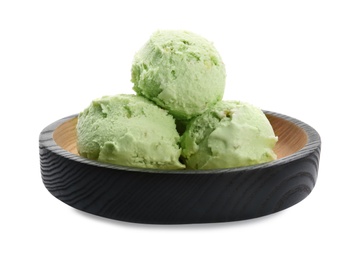 Photo of Plate of delicious pistachio ice cream on white background