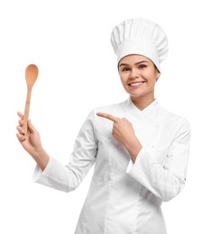 Photo of Happy female chef with wooden spoon on white background