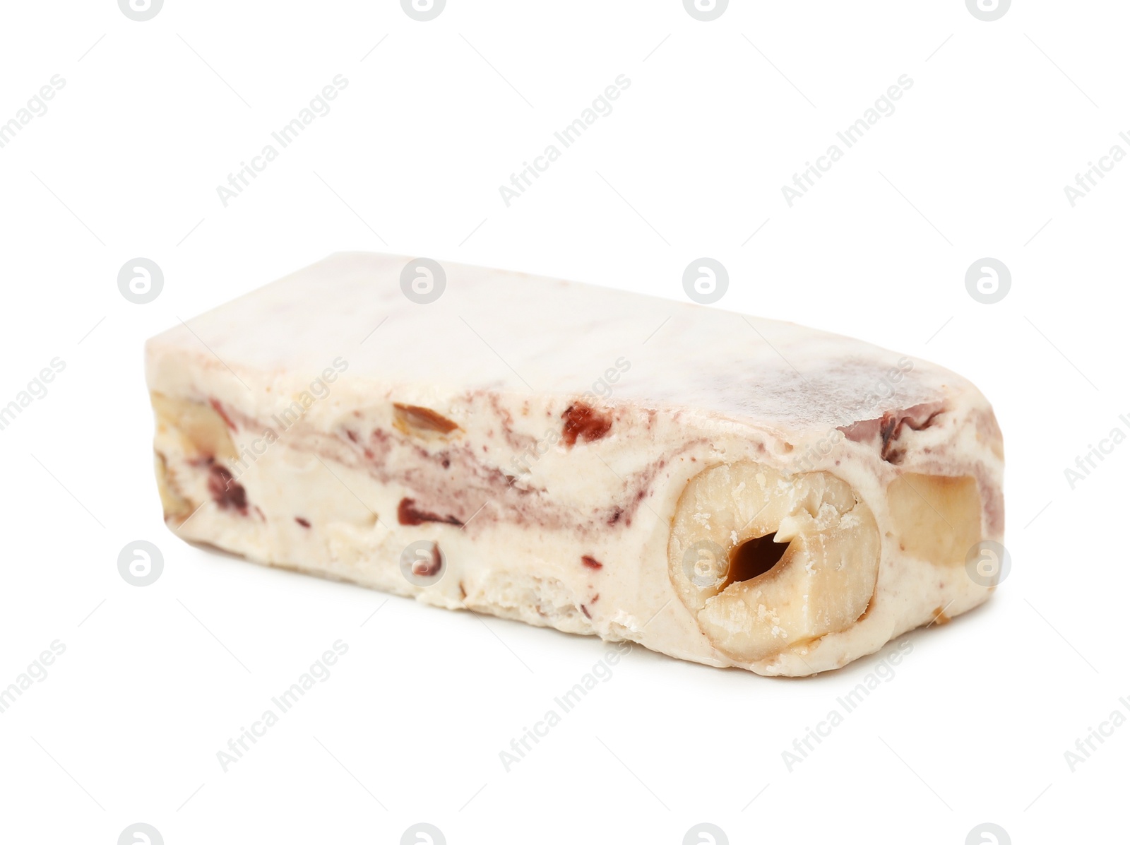 Photo of Piece of delicious nougat on white background