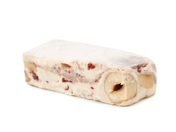 Photo of Piece of delicious nougat on white background