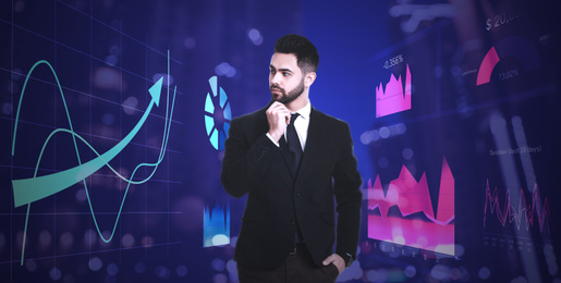 Young businessman in office wear looking on virtual screen with different schemes, banner design. Finance trading concept