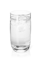 Glass of soda water with ice cubes isolated on white