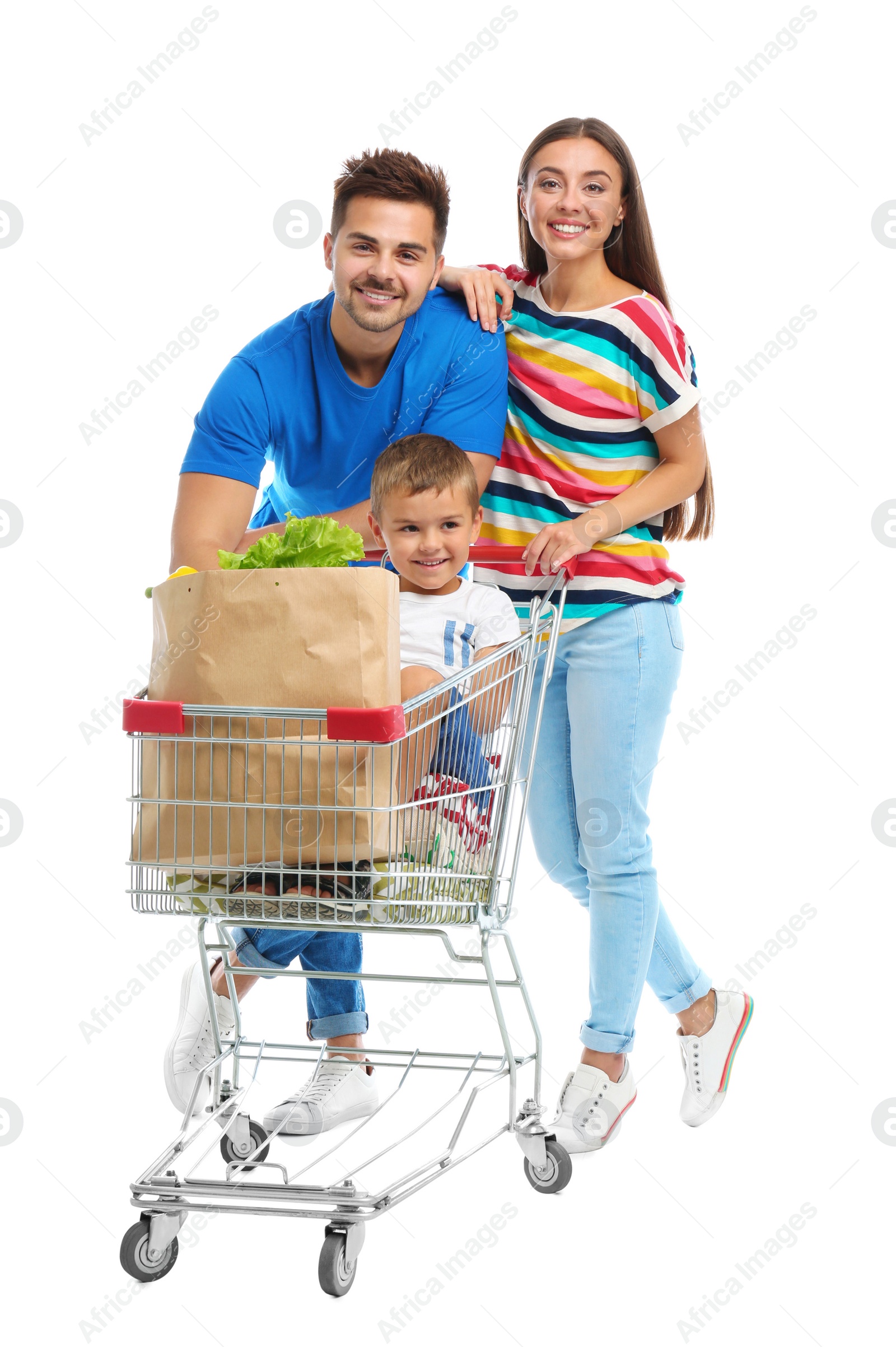 Photo of Happy family with shopping cart on white background