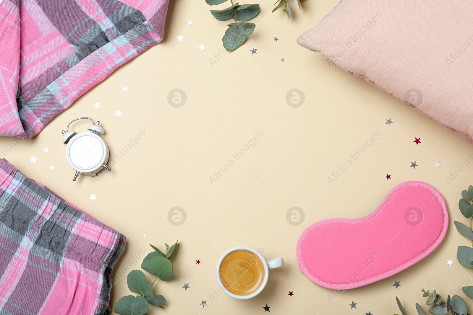 Photo of Flat lay composition with sleeping mask on yellow background, space for text. Bedtime accessories