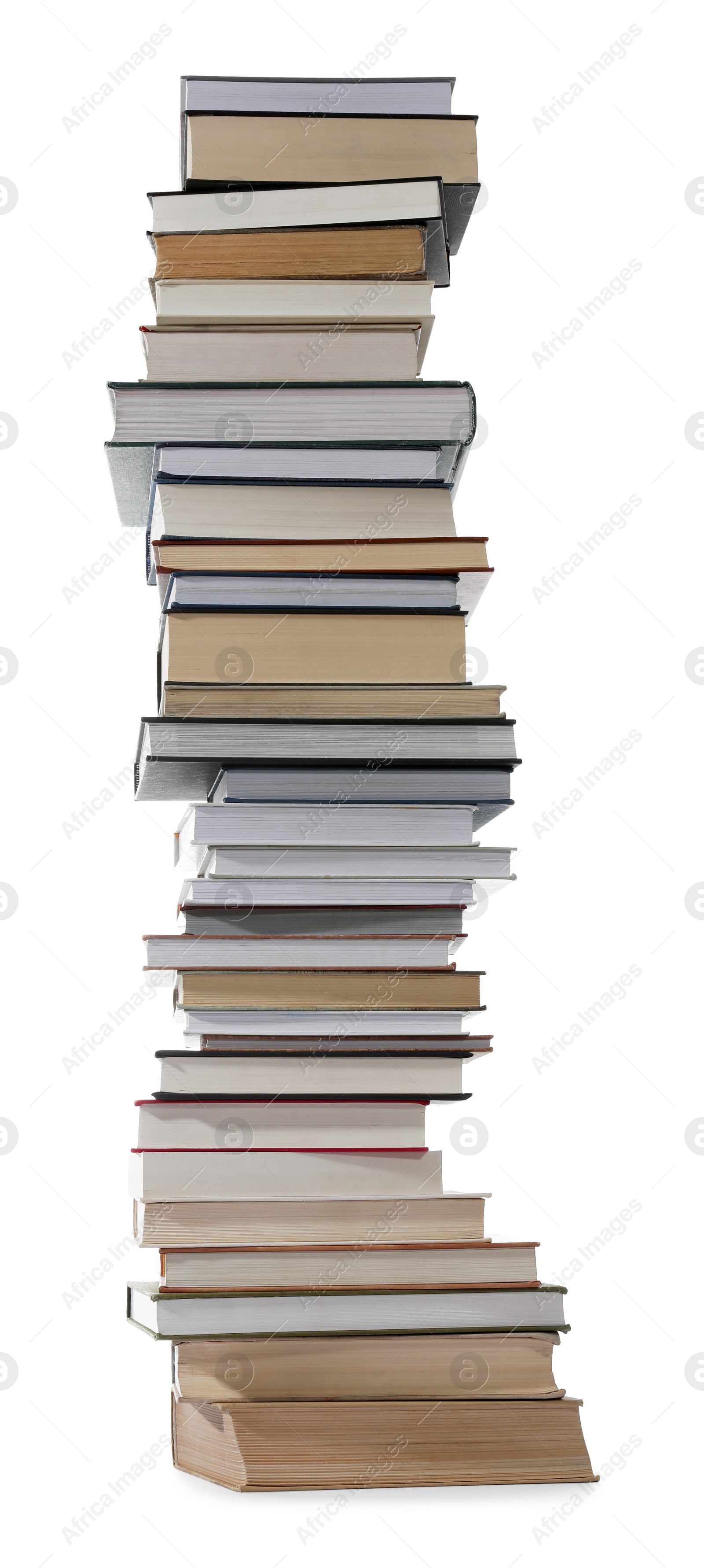 Photo of High stack of many different books isolated on white