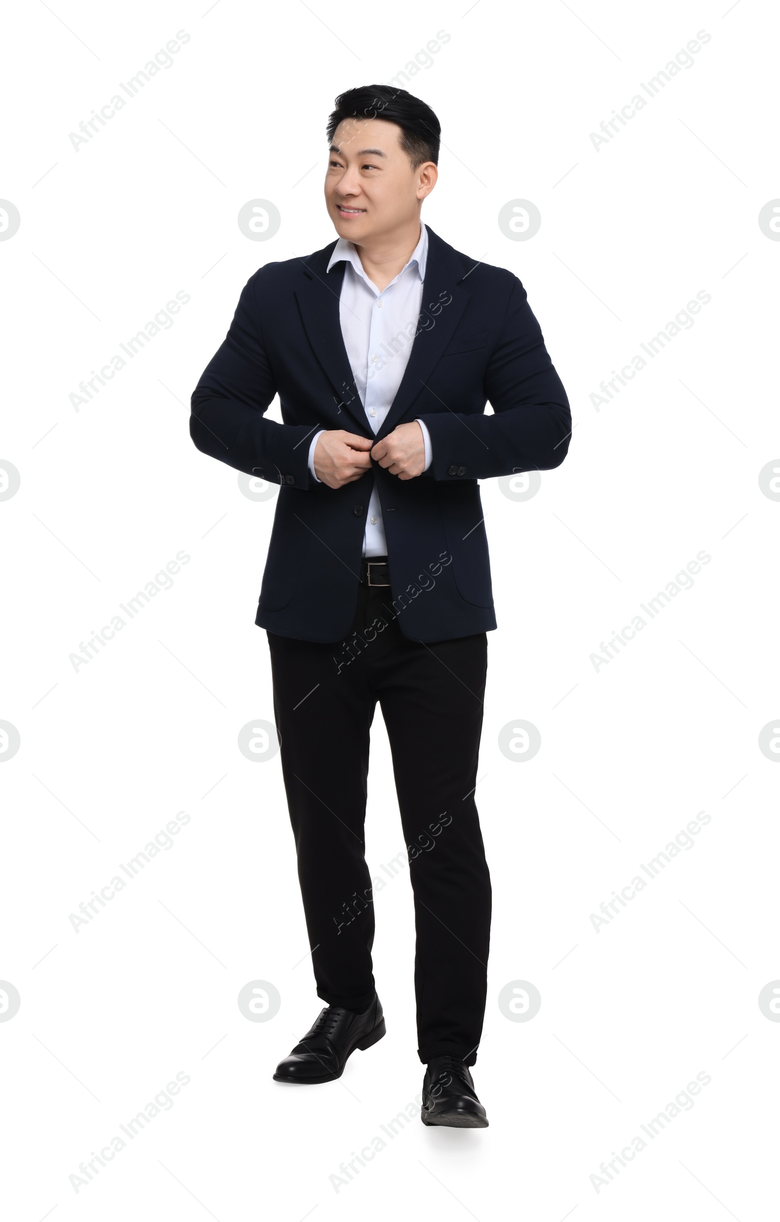 Photo of Businessman in suit posing on white background