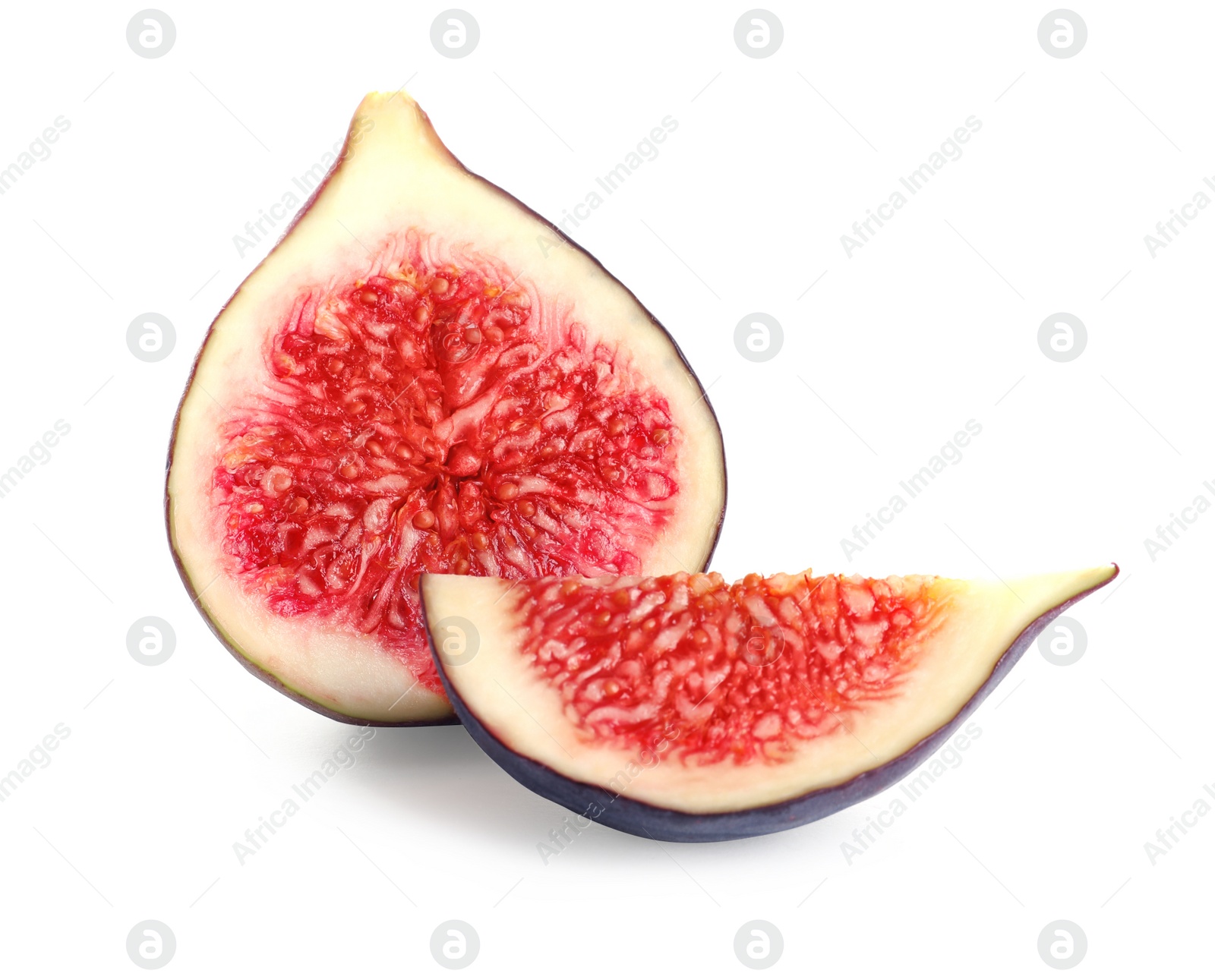 Photo of Pieces of ripe purple fig on white background