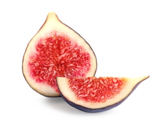 Pieces of ripe purple fig on white background