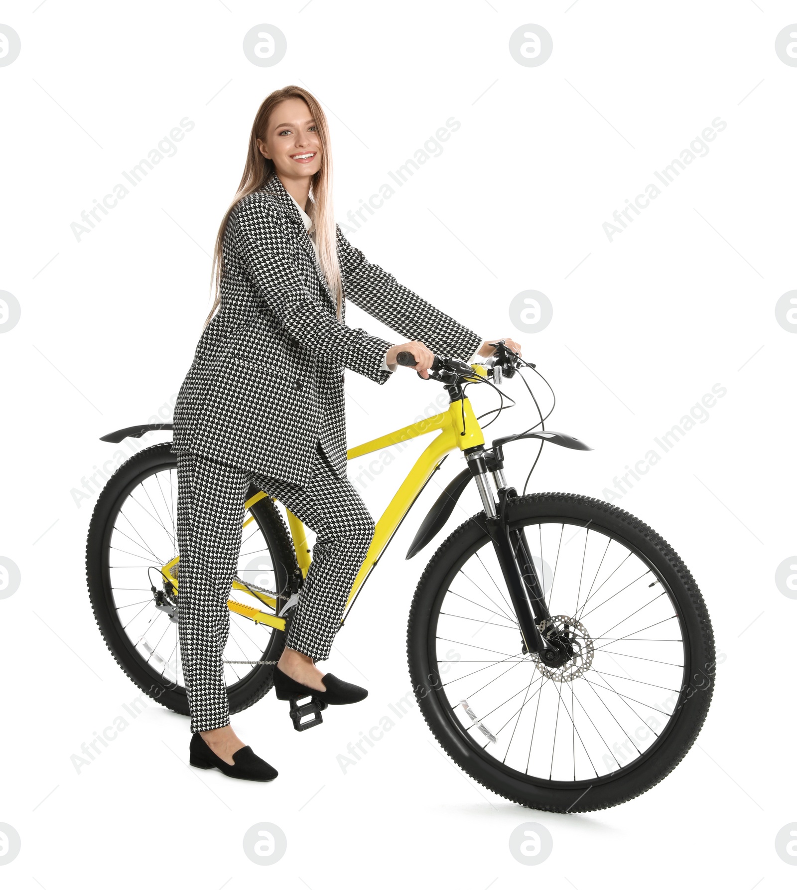 Photo of Young businesswoman with bicycle on white background