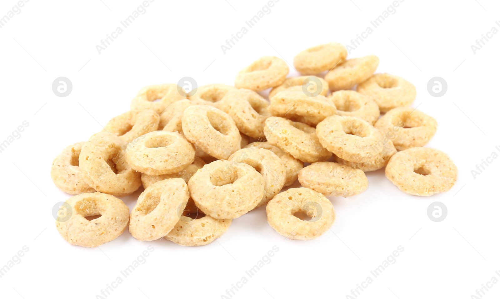 Photo of Pile of tasty corn rings on white background. Healthy breakfast cereal