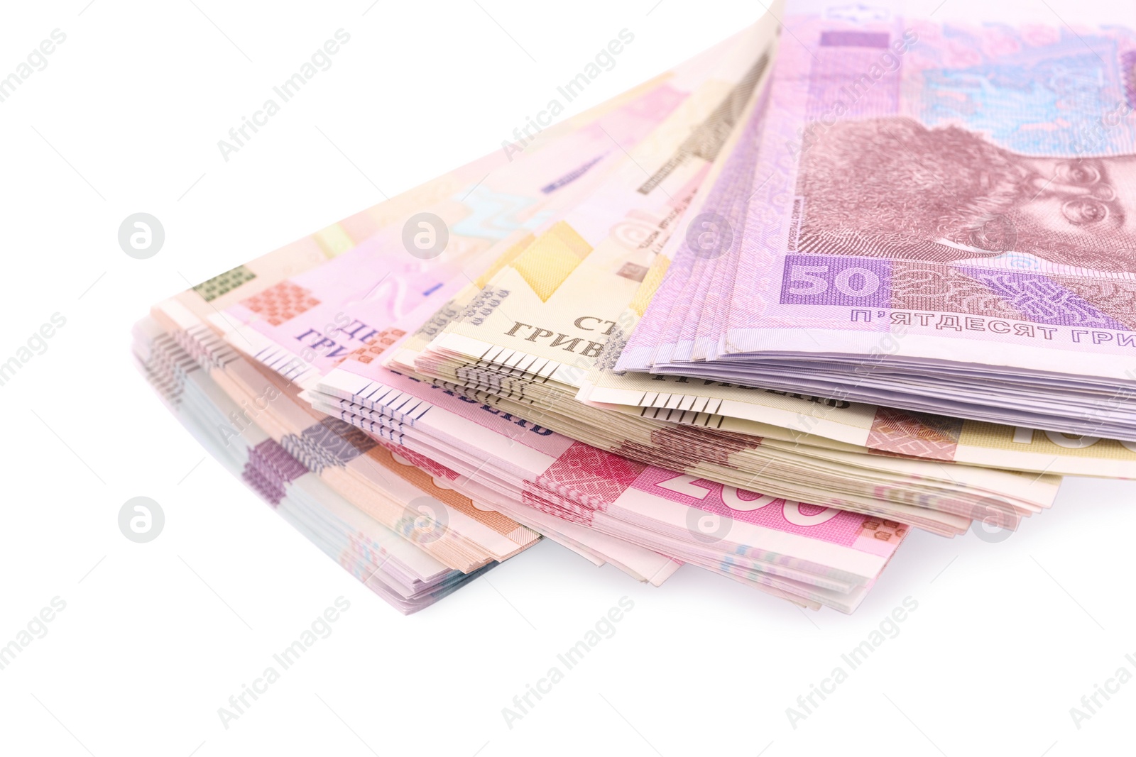 Photo of Ukrainian money on white background, closeup. National currency