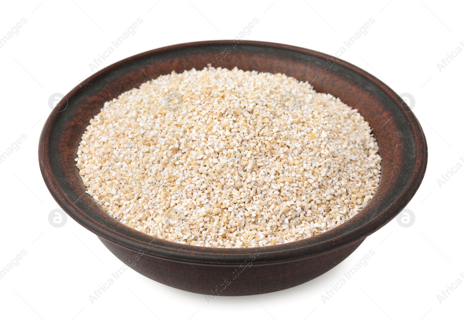 Photo of Raw barley groats in bowl isolated on white