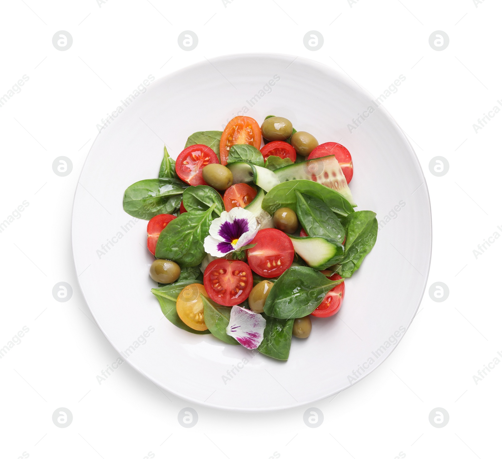 Photo of Bowl of delicious salad with vegetables and olives isolated on white, top view