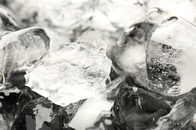 Photo of Pieces of crushed ice as background, closeup