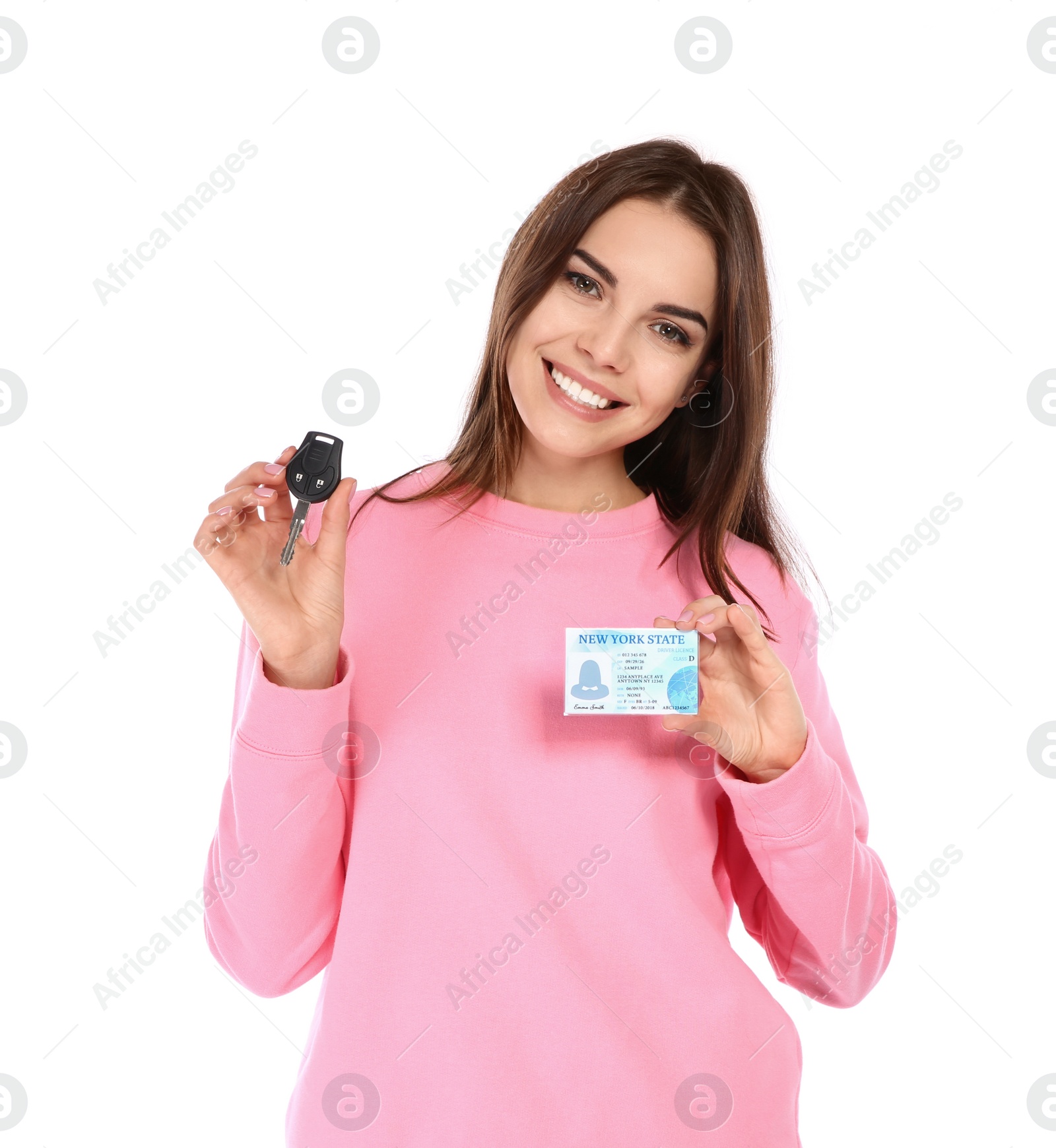 Photo of Happy young woman with driving license and car key on white background