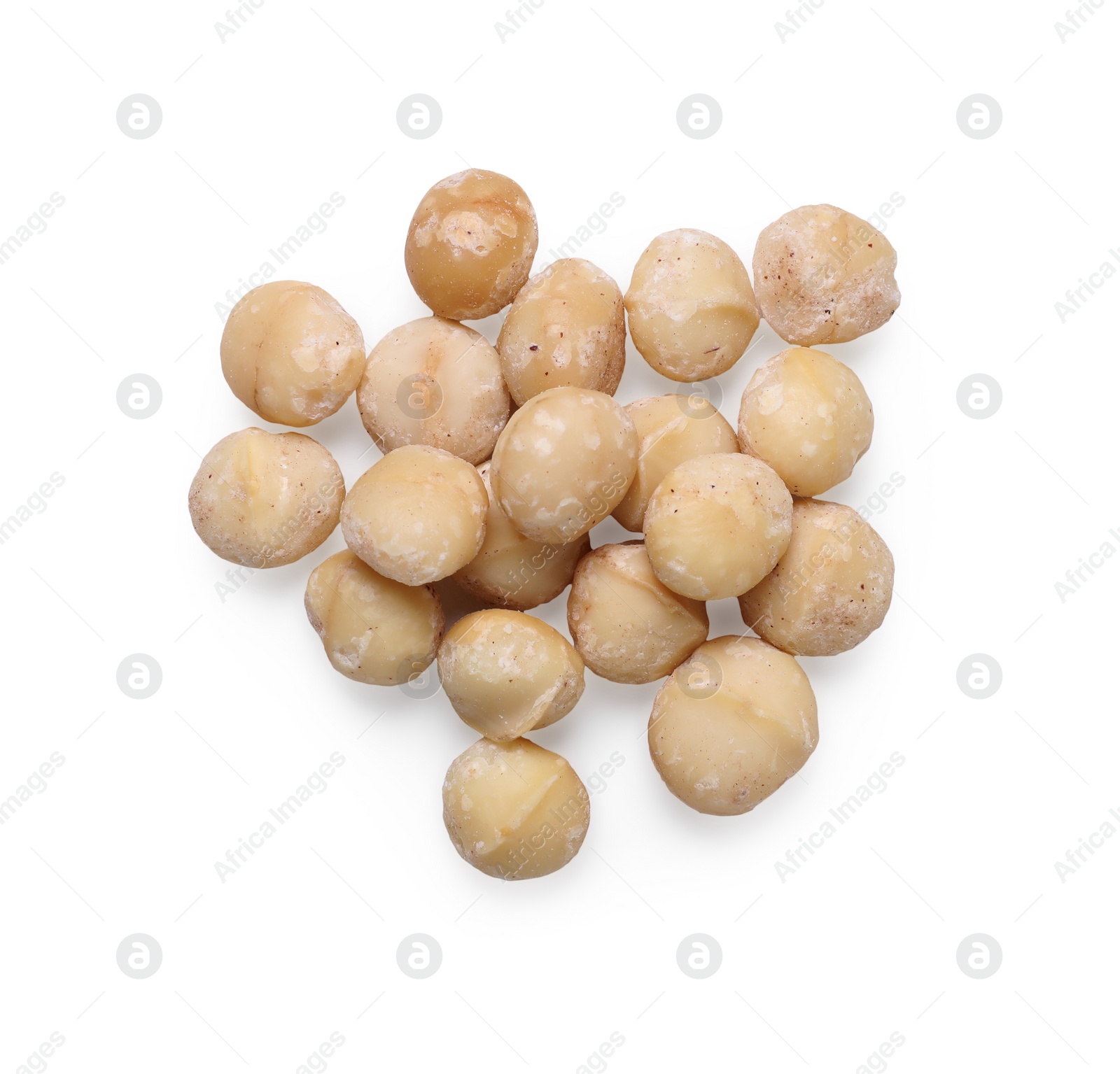 Photo of Delicious shelled Macadamia nuts isolated on white, top view