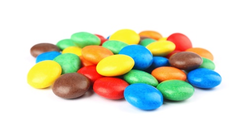 Photo of Pile of colorful candies on white background