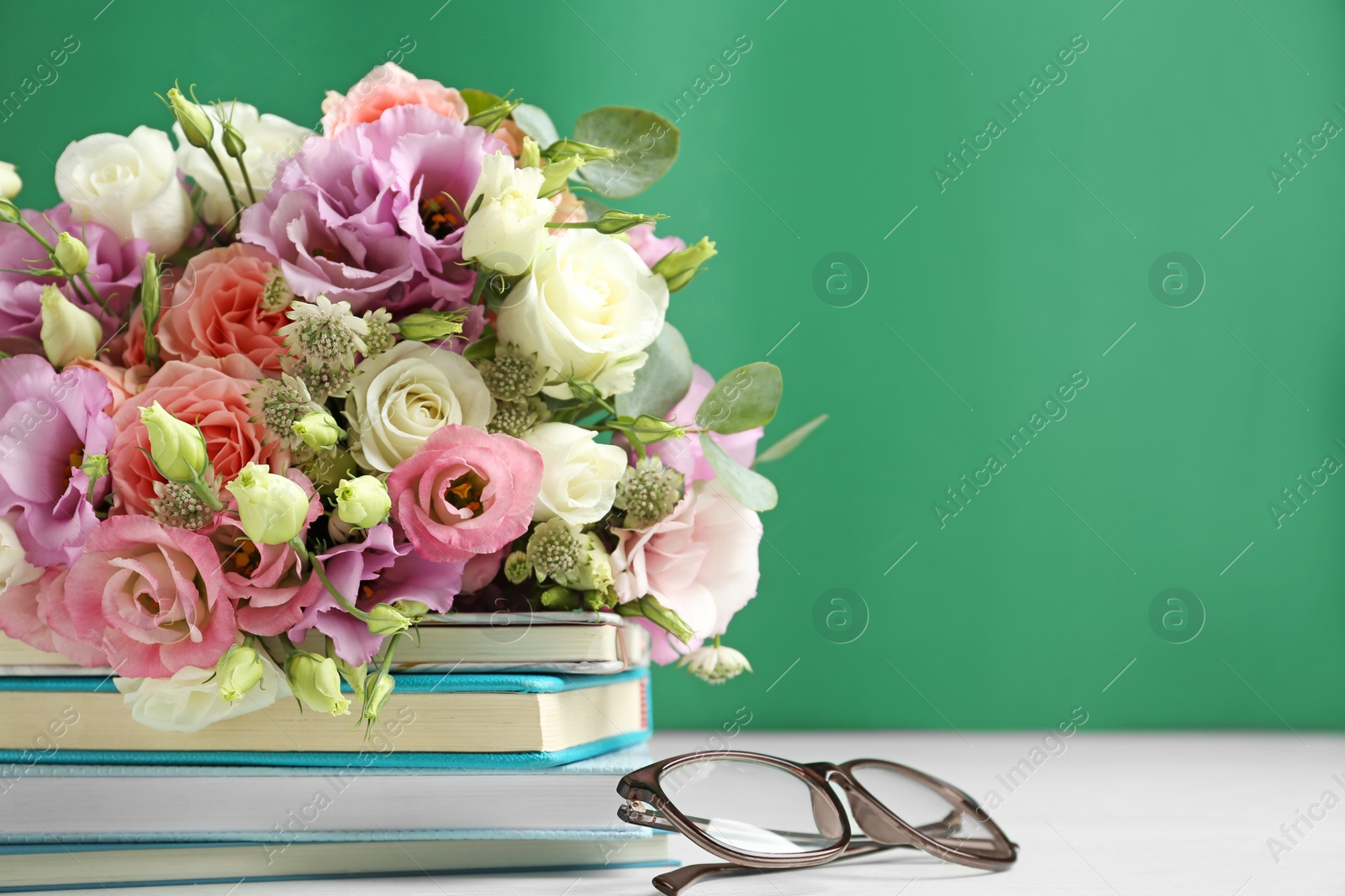 Photo of Composition with flowers for Teacher's day on white table