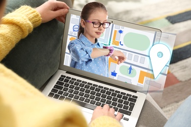 Image of Control kid's geolocation via smart watch. Woman using laptop indoors, closeup