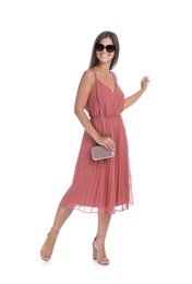 Young woman wearing stylish pale pink dress on white background