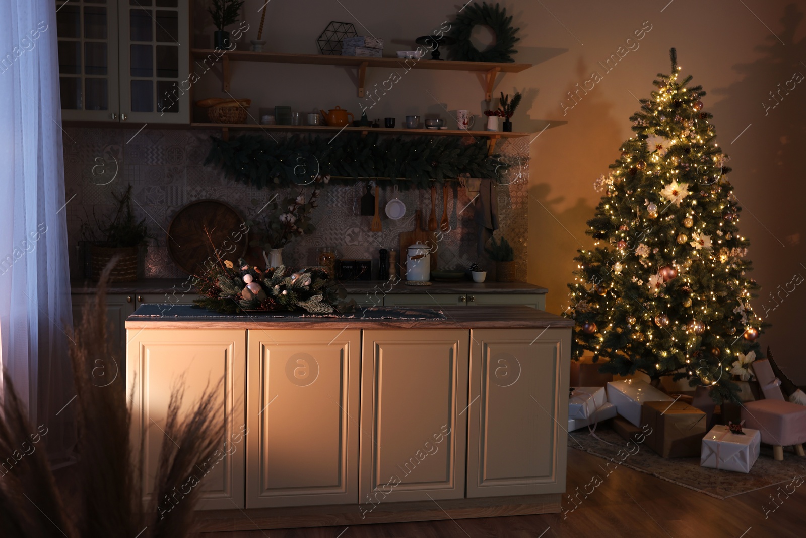 Photo of Stylish room with Christmas tree and festive decor. Interior design