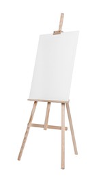 Photo of Wooden easel with canvas isolated on white. Artist's equipment