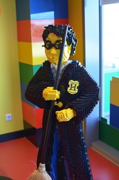 Photo of AMSTERDAM, NETHERLANDS - SEPTEMBER 10, 2022: Harry Potter figure made with colorful Lego constructor indoors