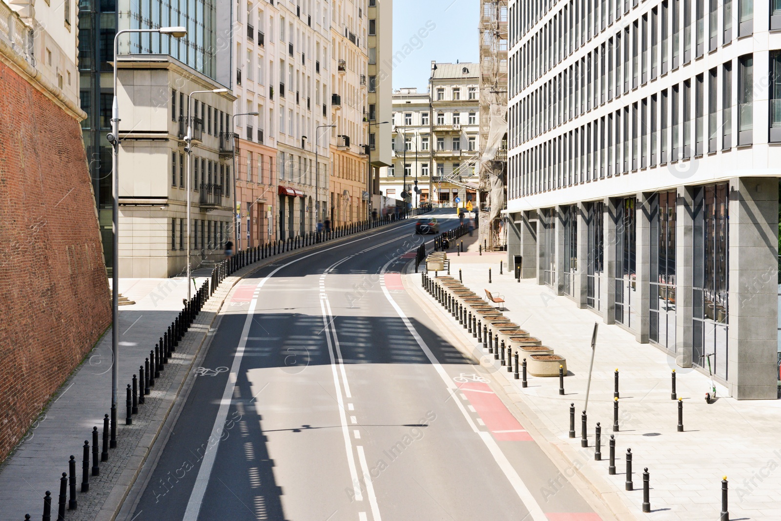 Photo of Beautiful road with car near buildings in city